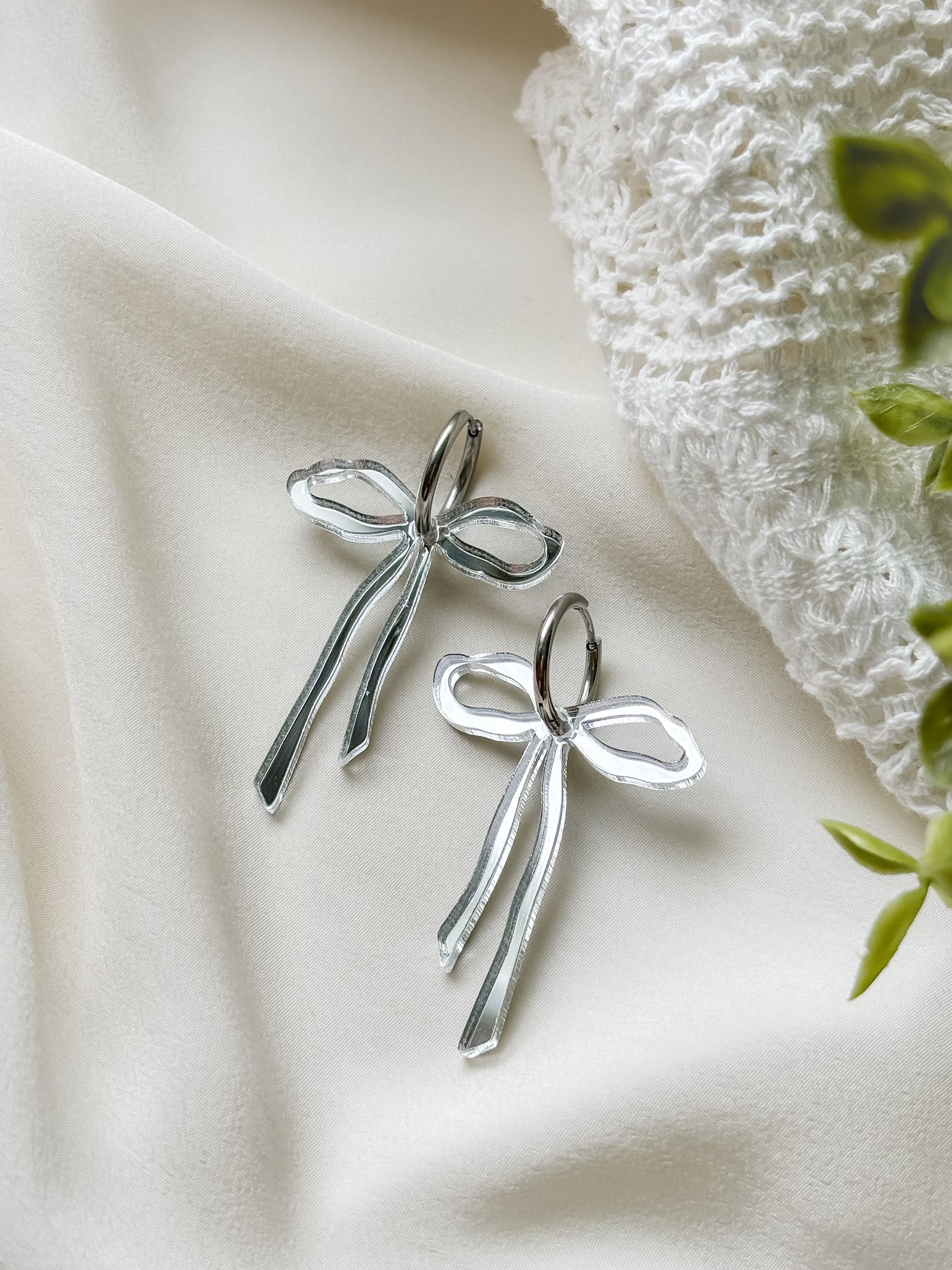 Bow silver korvakorut