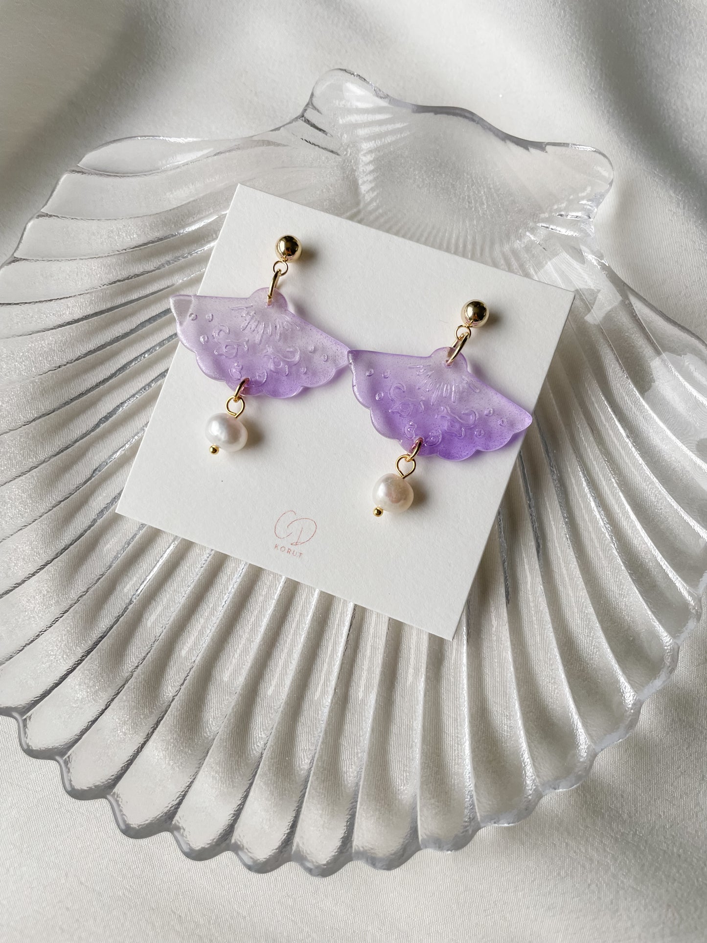 Korvakorut Fan makean veden helmi