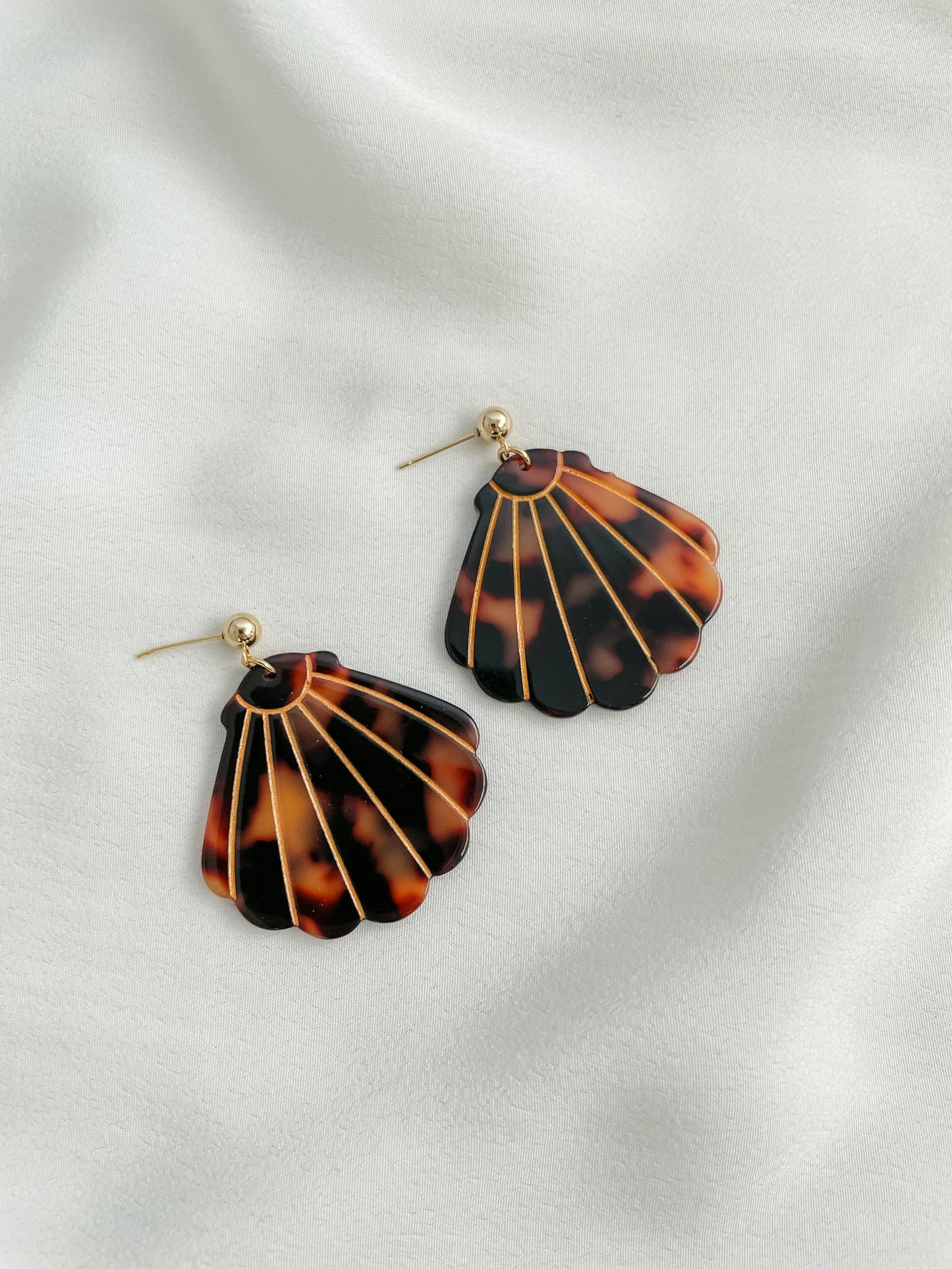 Korvakorut Simpukka ruskea