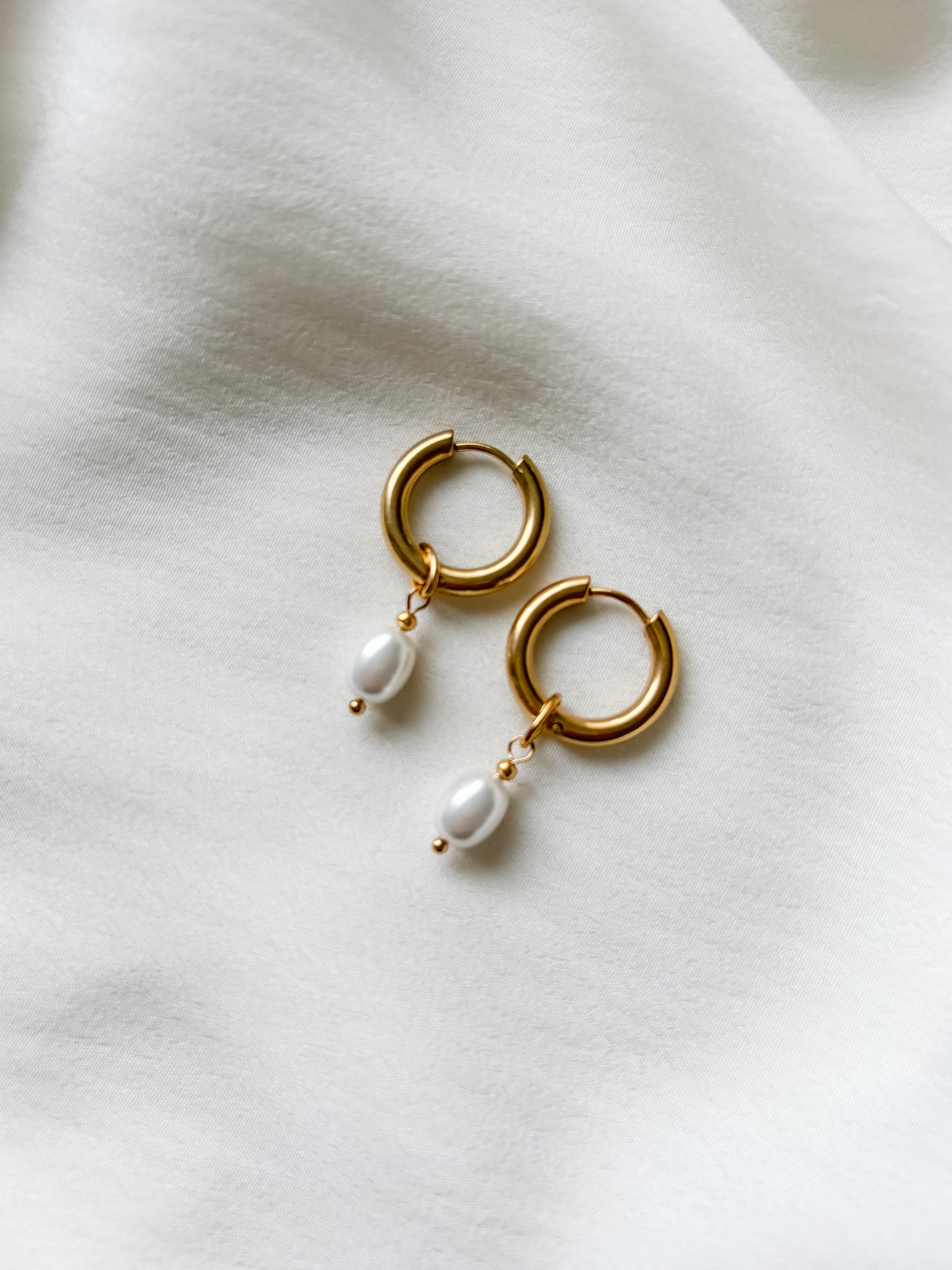 Korvakorut lasihelmillä